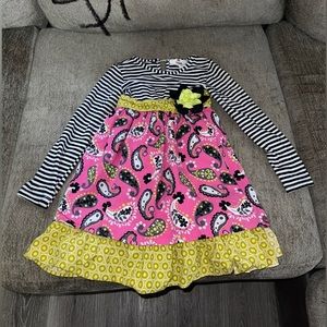 Boutique little girl size 5 or 6. Like new condition no rips or stains.